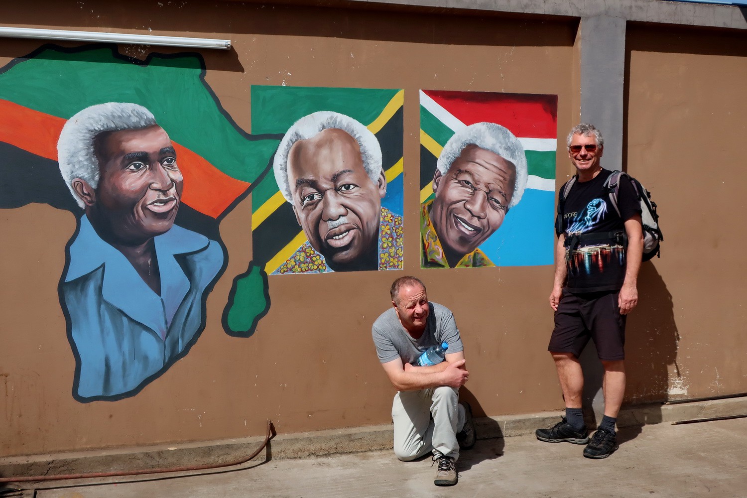 African politicians on the wall - Julius Nyerere (center) and Nelson Mandela (right)